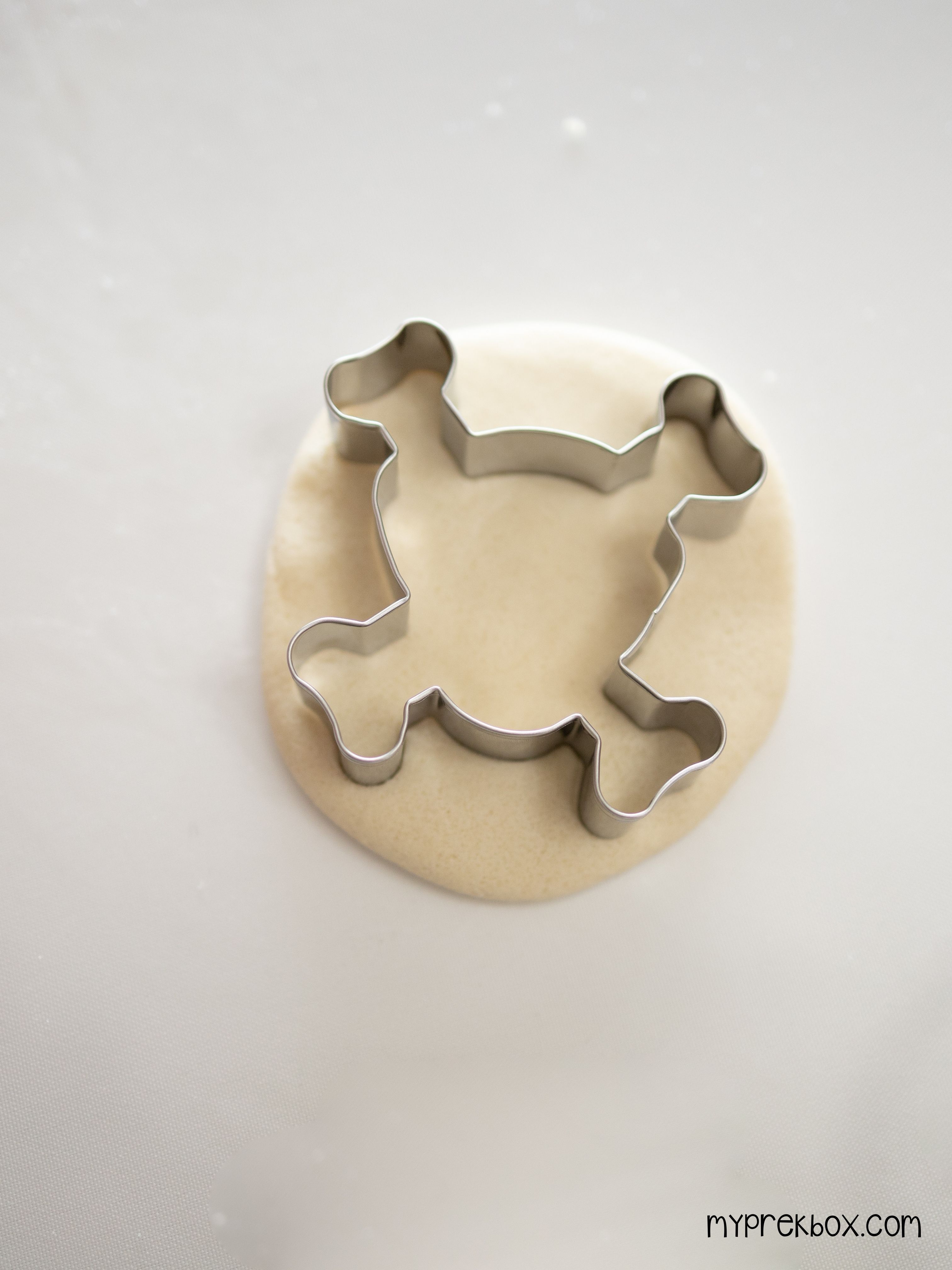 diy-pirate-doubloons-press-cookie-cutter-into-dough