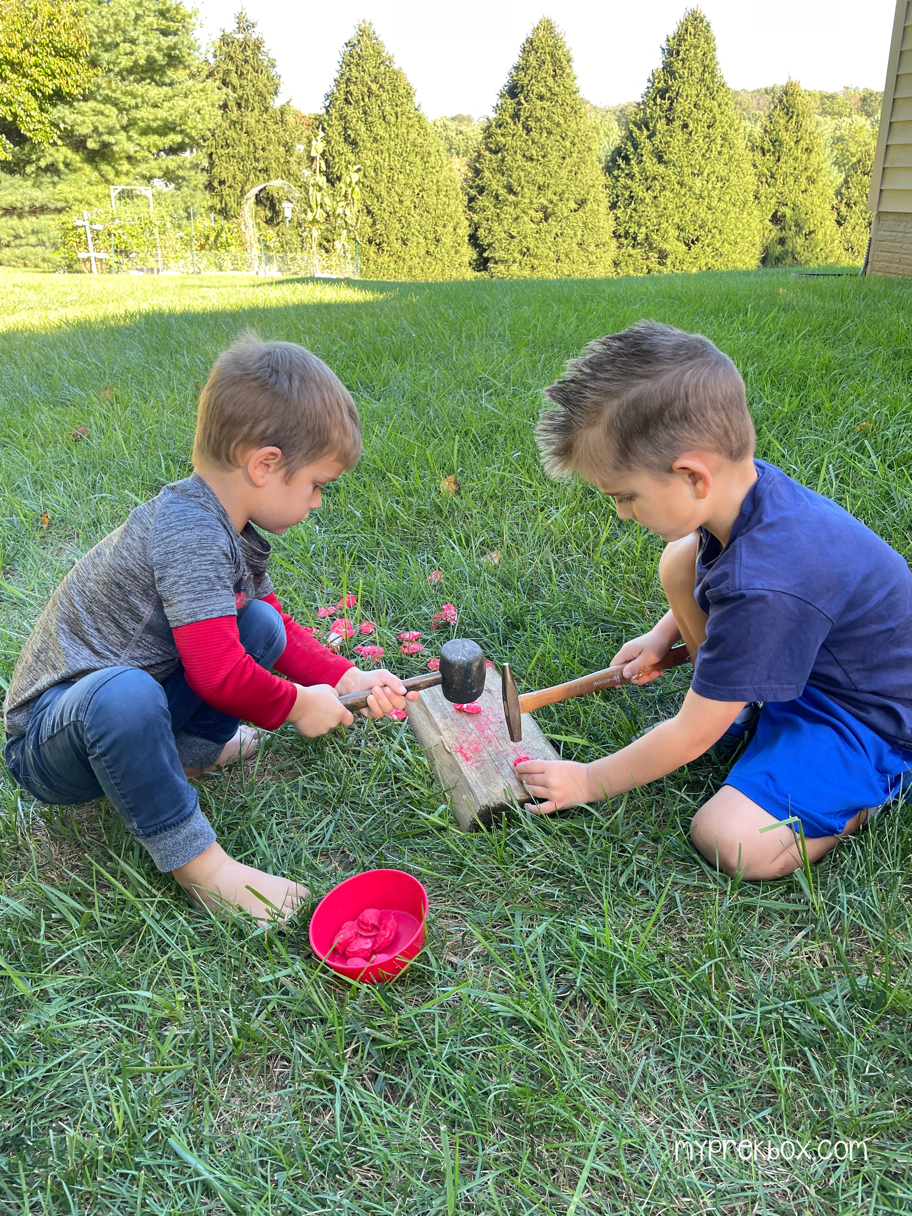 apple smash, kids smashing apples with hammer