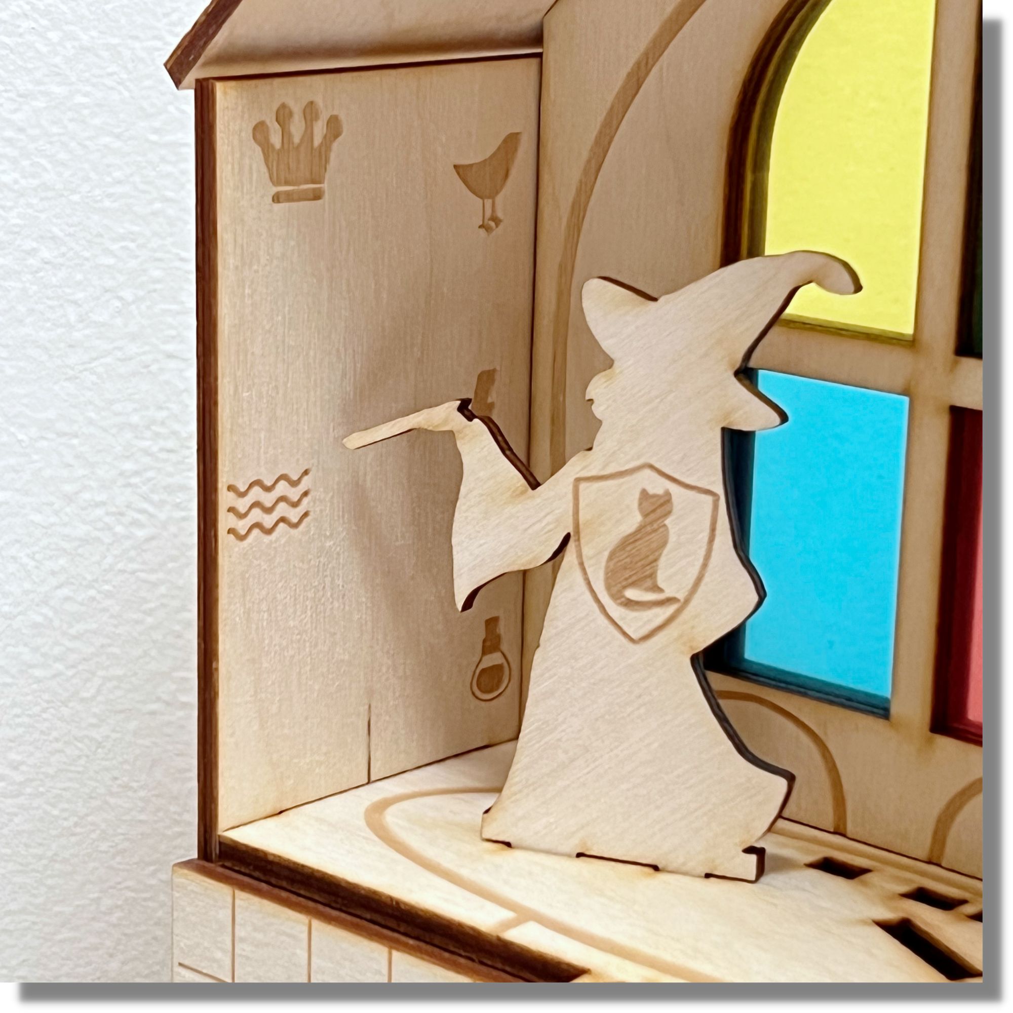Wooden tower prop with witch avatar inside, included in School of Magic Mystic Case box.