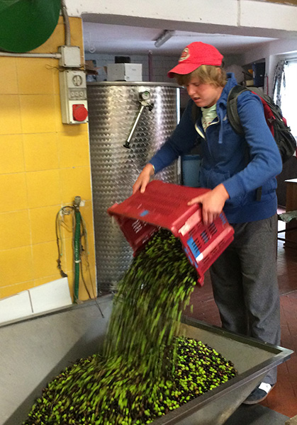 Toby with his first vats of oil