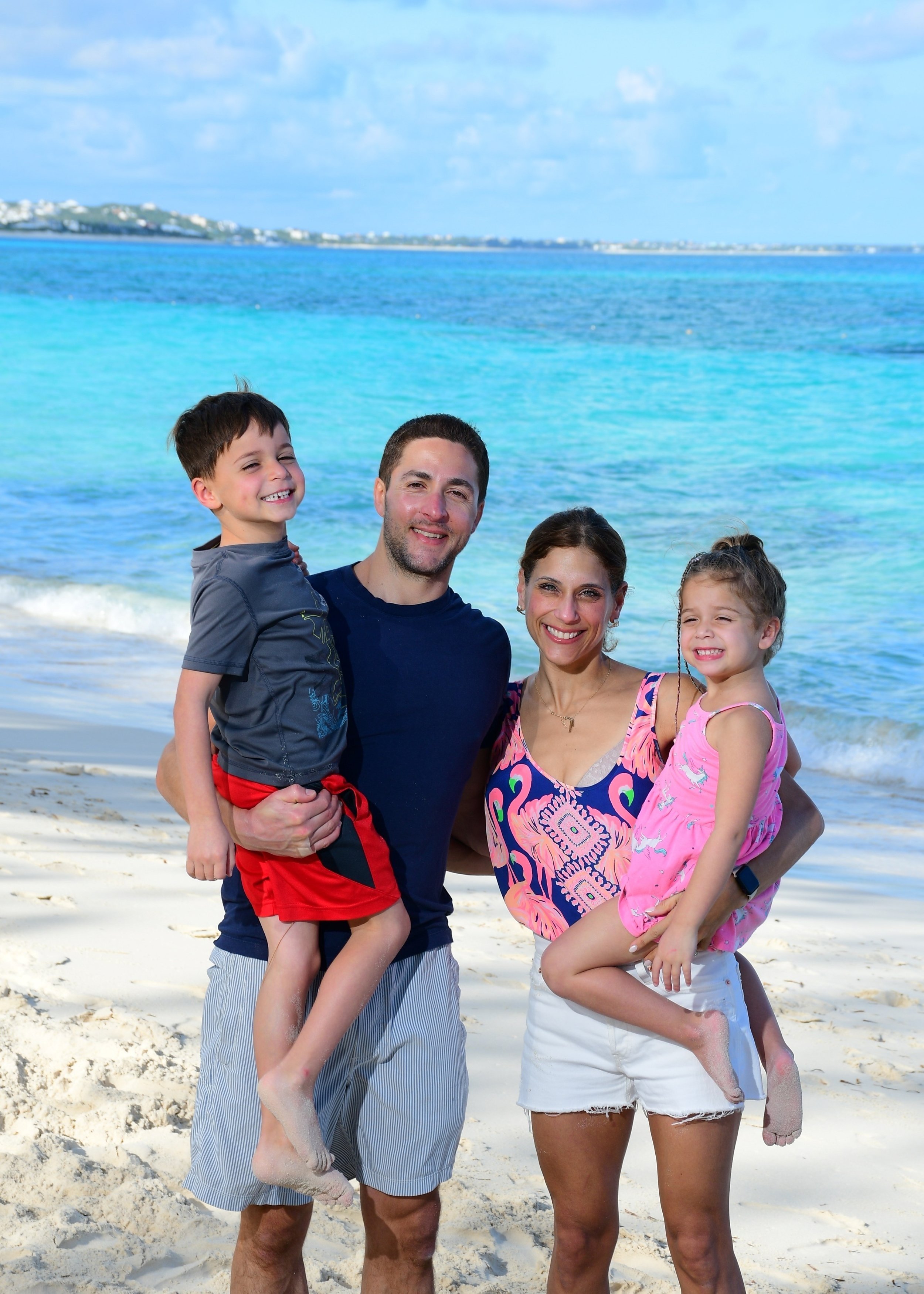 Our mission - Happy family on the beach