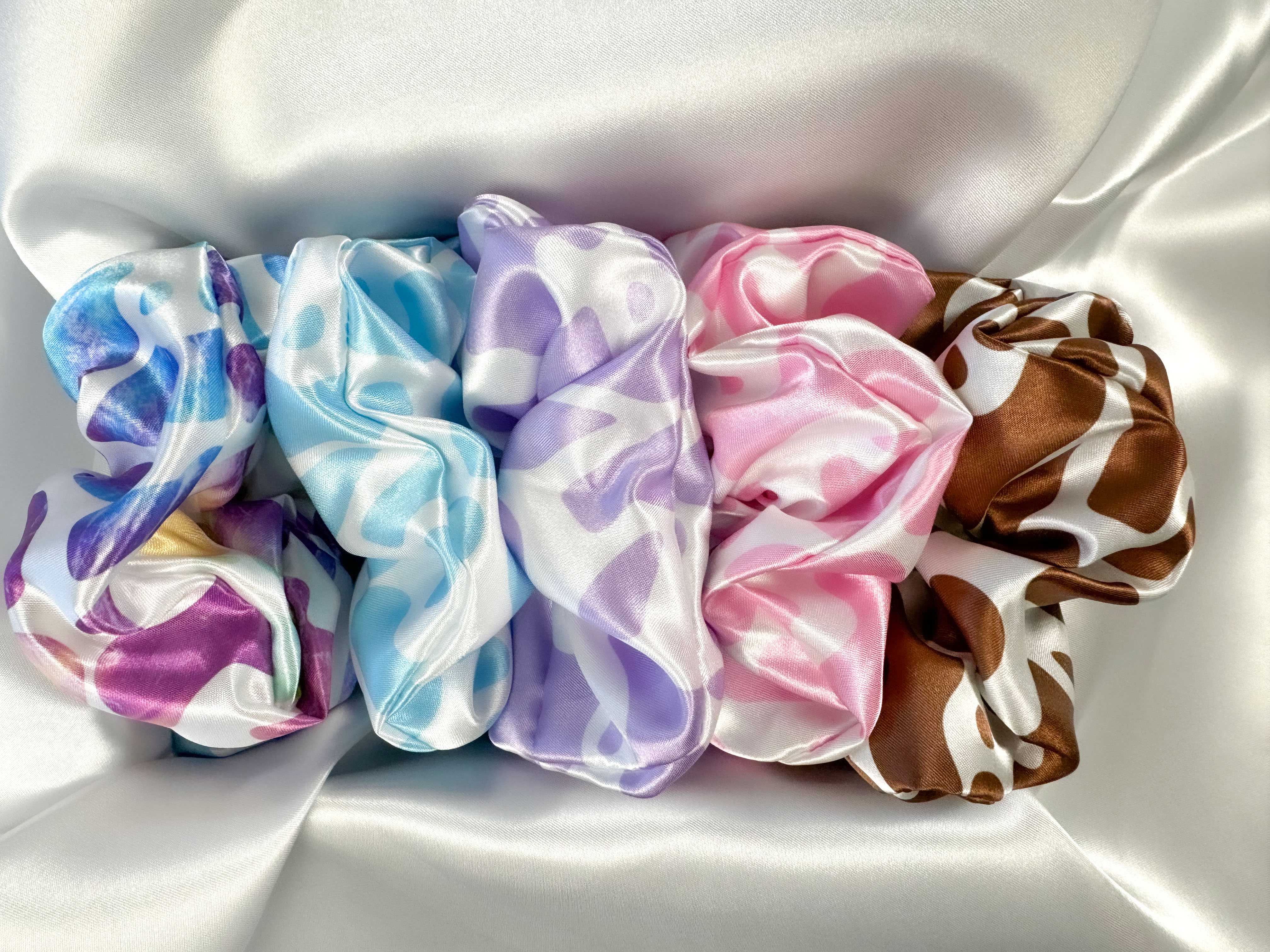 334-scrunchie-5-pack-cow-print-top-view-17540602313532.jpg