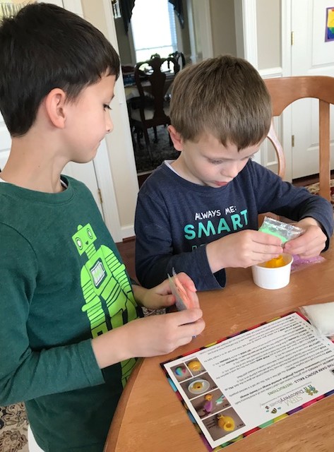 Boys making bouncy balls