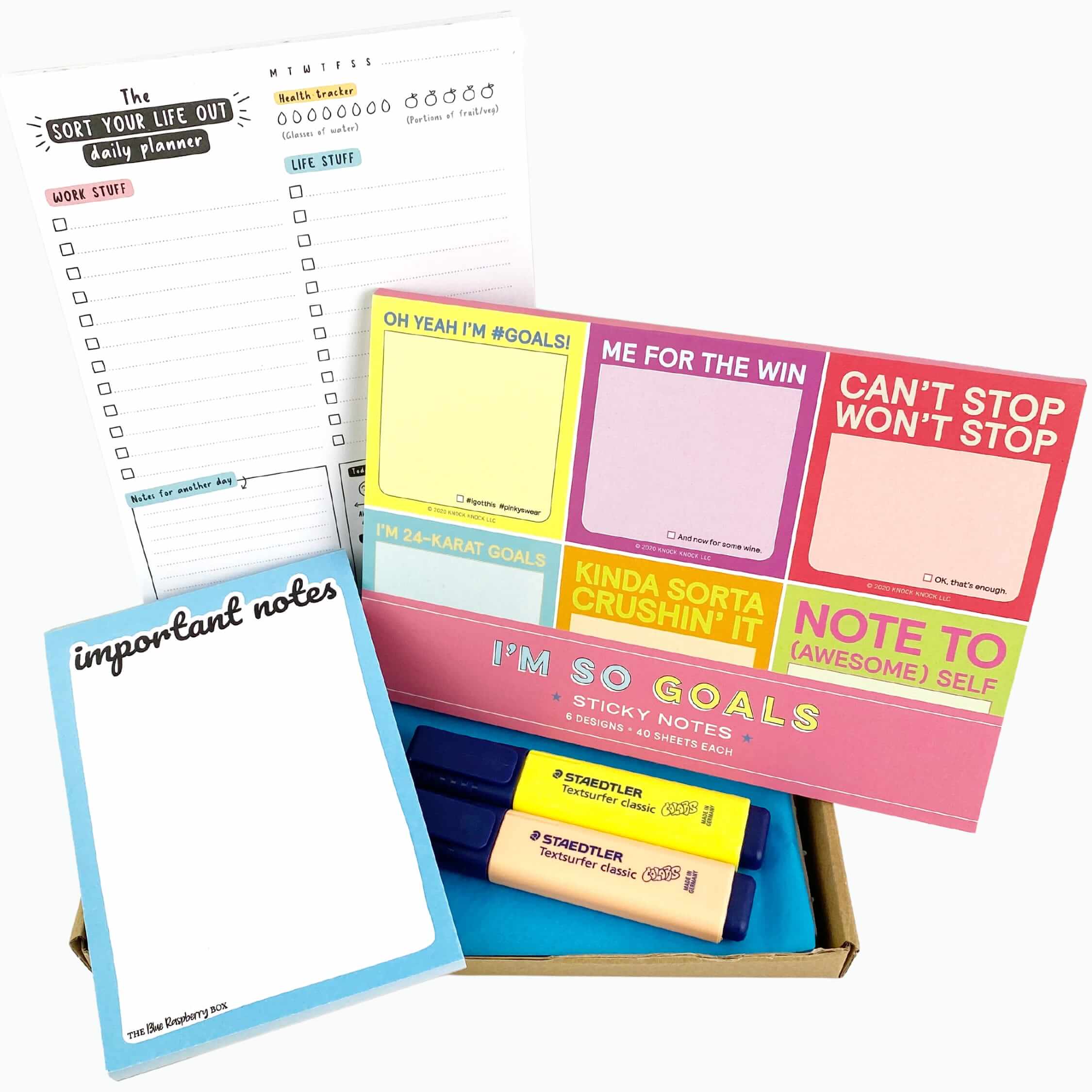 Daily planner, bright sticky note pack, notepad and highlighters in a letterbox friendly box