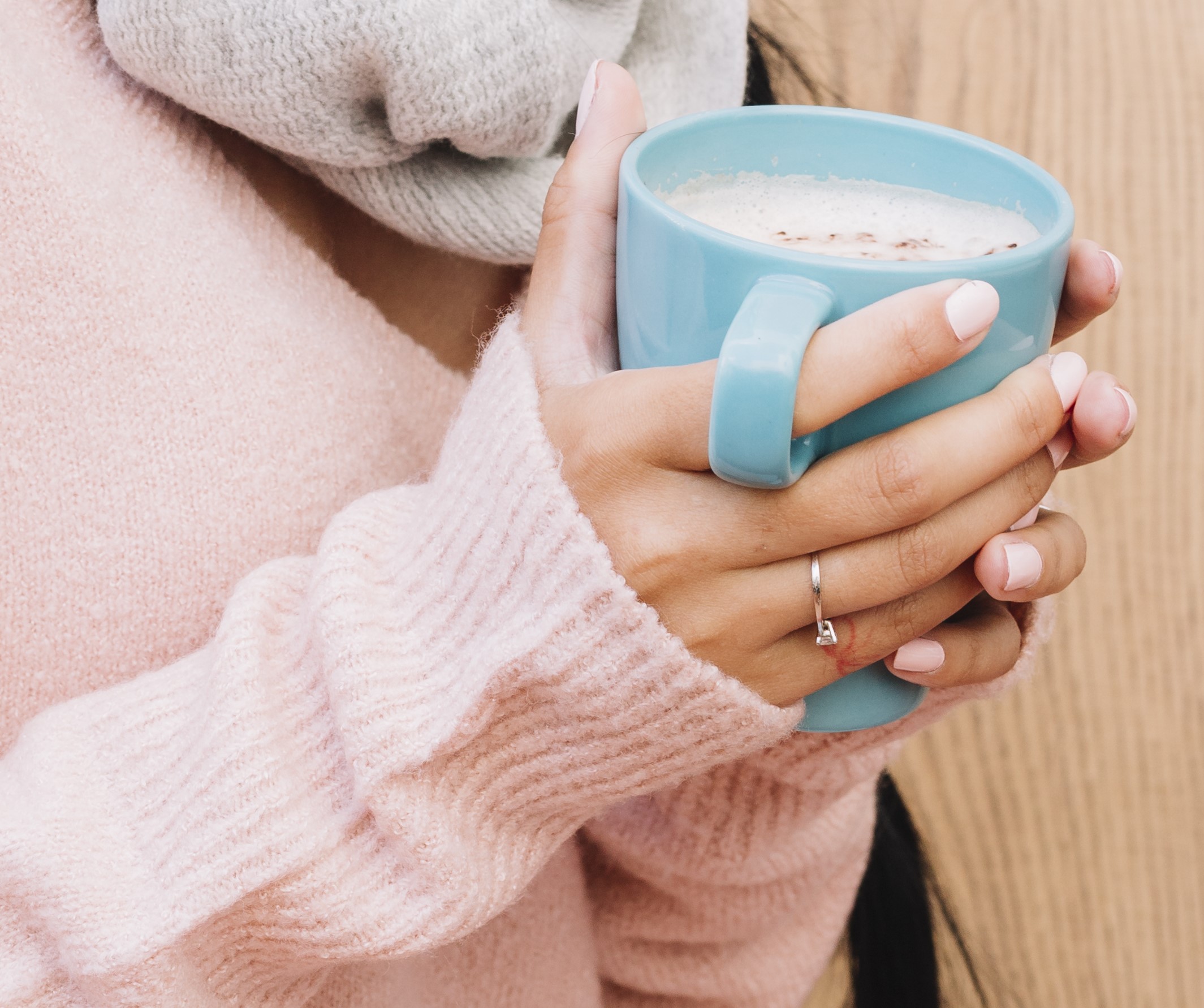 342-woman-grey-cap-with-coffee-cup-17292525130166.jpg