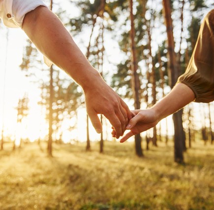102043542766-640-close-up-view-of-hands-happy-couple-is-outdoors-in-the-forest-at-daytime-17132340205937.jpg