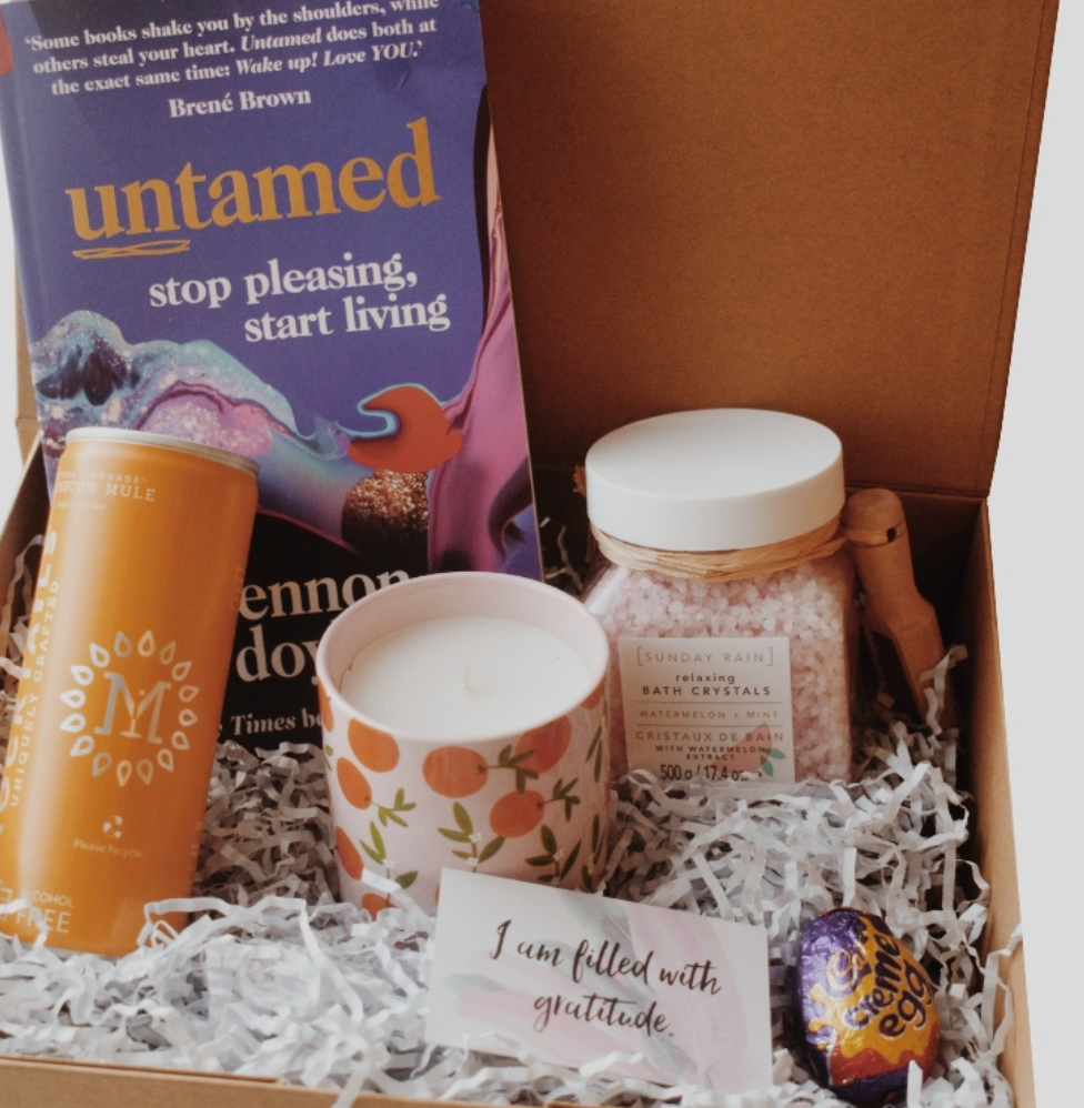 Photo of Whimsical Mama Box. Featuring 5 different self care and wellness products for mums.